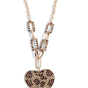 *NEW*  Paparazzi Gold and Black Heart Necklace

“Roadside Romance”